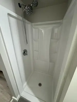 a shower in a bathroom with a white shower stall at Private Apartment in Southbury 102 in Southbury