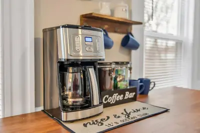 a coffee maker sitting on top of a counter at Classic West Hartford Center Apartment in West Hartford