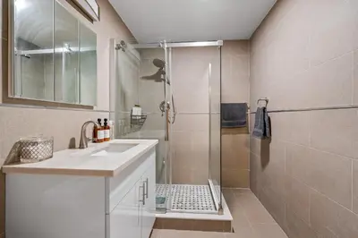 a bathroom with a sink and a shower at Active Central Park East 3bedrooms 2 bathrooms 1700 SF in New York
