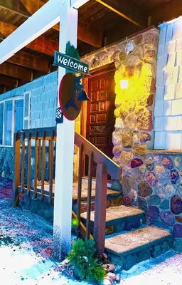 a street sign in front of a house at Catskills, The Bohemian Dream in Shandaken