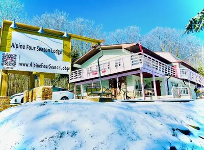 a house in the snow in front at Catskills, The Bohemian Dream in Shandaken