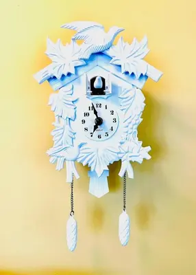 a clock on a wall with snowflakes on it at Catskill Cabin The Flamingo Suite 5 in Shandaken