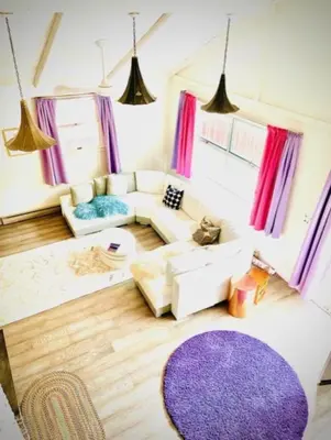 a living room with a couch and a purple rug at Alpine Four Season Lodge Shandaken NY sleeps 18 in Shandaken