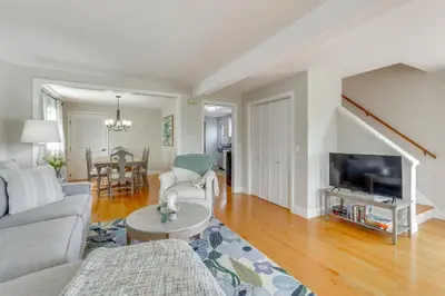 a living room with a couch and a tv at Walk to Beaches Sunny East Haven Home with Grill in West Haven