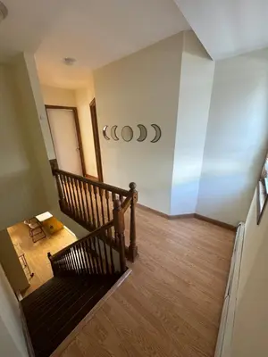 a view from the top of a staircase in a house at Sunny Apt by the park Mins away from midtown New York in Jersey City