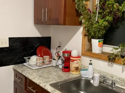 a kitchen counter top with a sink and a counter top at 2265 Bruckner Blvd Apartments in Bronx