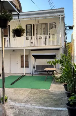 a house with a green mat in front of it at 2265 Bruckner Blvd Apartments in Bronx