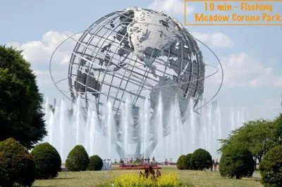 a water fountain in a park with a globe at Stylish- 1 bed room spacious APT in Corona