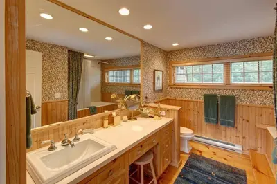 a large bathroom with a sink and a toilet at Catskill Ski Mountain Retreat with Private Pool in Big Indian