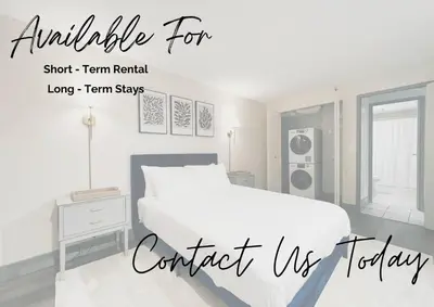 a white bedroom with a bed and a window at Convention Center 1BR Condo Downtown Hartford and GYM in Hartford