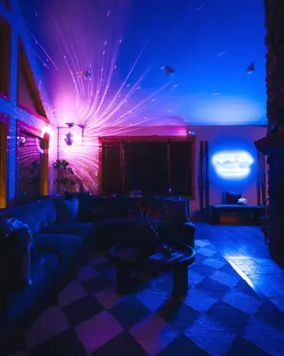 a living room with purple lights and a couch at Luxury Chalet, Firepit, Sauna, Pet Friendly, 5 mins to Windham Mtn resort in Windham