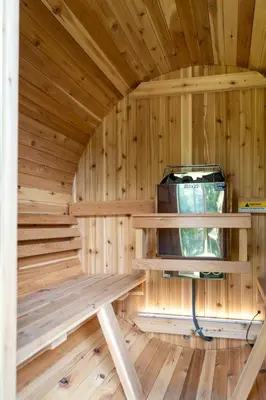 a wooden sauna with a bench in a room at Luxury Chalet, Firepit, Sauna, Pet Friendly, 5 mins to Windham Mtn resort in Windham