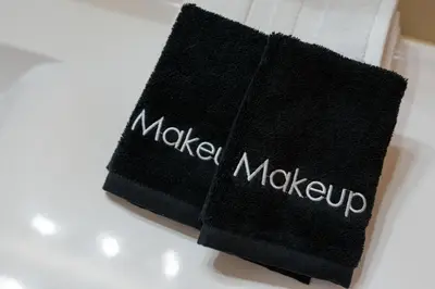 a black towel with the word masuu written on it at Luxury Chalet, Firepit, Sauna, Pet Friendly, 5 mins to Windham Mtn resort in Windham