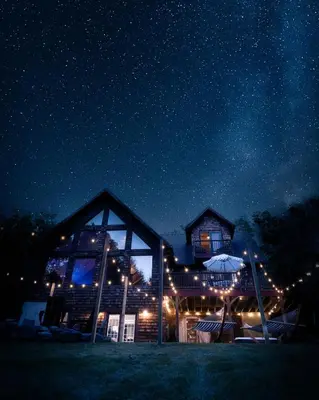 a house at night with a starry sky at Luxury Chalet, Firepit, Sauna, Pet Friendly, 5 mins to Windham Mtn resort in Windham