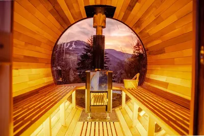 an inside view of a sauna with a fireplace at Hunter Haven - Luxury Cabin Near Mountain Ski Resort in Lanesville