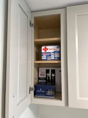 a kitchen cabinet with a drawer with a box of milk at 2 Bd 2 Ba Unit laundry &kitchen in Great Neck