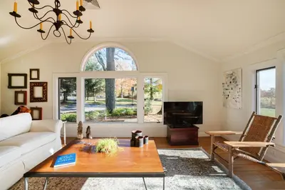 a living room with a couch and a table at ABC Stay - Connecticut Five Bedroom Home in Warren
