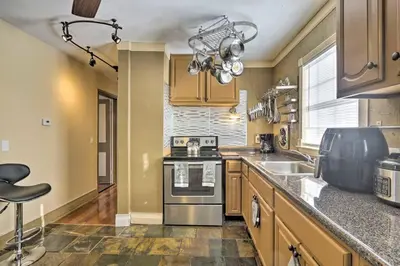 a kitchen with a stove and a sink at New Quaint & Convenient Hideaway Great Location in East Hartford