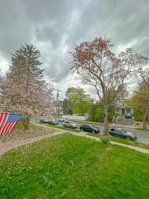 a street with cars parked in a parking lot at The Allen House - 3 Bedroom - 2 Full Bath - Private Gorgeous Apartment - Sleeps 8 in Albany