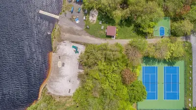 an aerial view of an island in the water at Winter Hideaway - Sled Hill, Hot Tub, Fireplace, Game Room in Gouldsboro