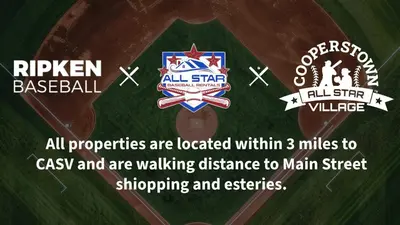 a sign for a baseball field with logos on it at Pitcher's Paradise Apt 2-All Star Baseball Rentals in Oneonta