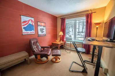 a room with a desk and a chair and a computer at Vermont Ski Home Lake Home in Jacksonville