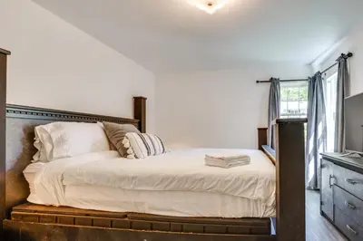 a bedroom with a bed and a window at 4 Mi to NYC, Shared Yard Englewood Apartment! in Englewood