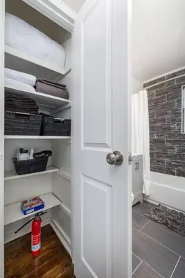 a room with a door open to a closet at Queen Bed Apt in West Hartford in West Hartford