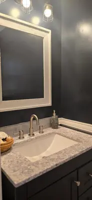 a bathroom counter with a sink and a mirror at Sparta lakehouse in Sparta