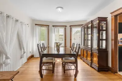 a dining room with a table and chairs at 3BR Gem, 10 min to Yale, walk to Tweed in New Haven