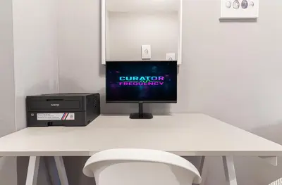 a desk with a computer and a monitor on it at Chic 3Bd 1Bth Near Empire State in New York