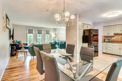 a dining room and living room with a table and chairs at Family Home Close to Warwick, 5 Mi to Lake! in Monroe