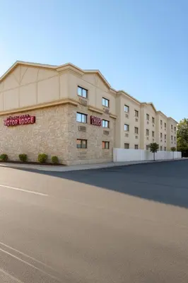 a rendering of the exterior of a hotel building at Floral Park Motor Lodge in Floral Park