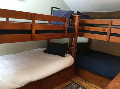 a couple of bunk beds in a room at Stratton Chalet in Stratton