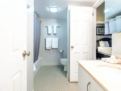 a bathroom with a toilet and a sink at Centrally Located Apt Downtown in Stamford