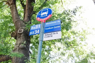 a street sign in front of a tree at Harty's Terrace 9 Kimball Avenue in Yonkers