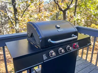 a grill sitting on top of a table at Modern Lakefront Oasis Relaxing Hot Tub Sauna Game Rooms Stunning Views! in East Stroudsburg