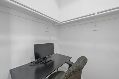 a room with a table and two chairs at Skyline Serenity Luxe NYC Retreat in Jersey City
