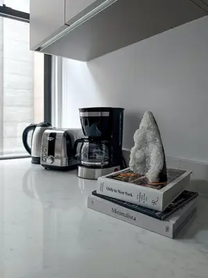 a box of white crystals sitting on a kitchen counter at One Dutch Hotel in New York