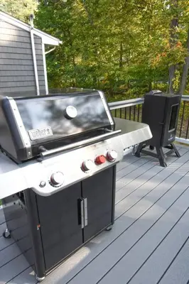 a grill sitting on top of a deck at Hudson Valley Haven - NY in Red Hook