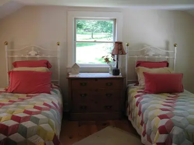 a bedroom with two beds and a window at Omega Special, Sun thru thurs 5 night minimum in Clinton Corners