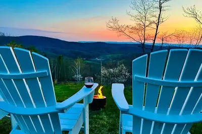 two blue adirondack chairs with a glass of wine at SRC-Hudson Valley, Berkshires Cultural Corridor in Canaan