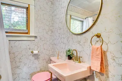 a bathroom with a sink and a mirror at Pet-Friendly Catskills Retreat Fire Pit and Deck! in Grand Gorge