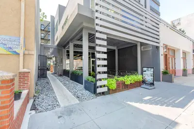 a building with a staircase in front of it at E Village 1BR w Doorman Gym nr Union Sq NYC-10 in New York