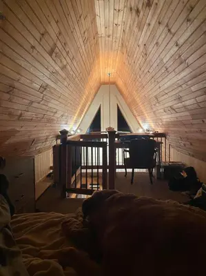 a bedroom with a wooden ceiling with a grand piano at Corner's Cabin - A-Frame - Catskills NY in South New Berlin