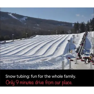 a ski slope with snow tubingfur for the whole family only minutes drive at Cabin near kalahari,camelback Ski in Long Pond