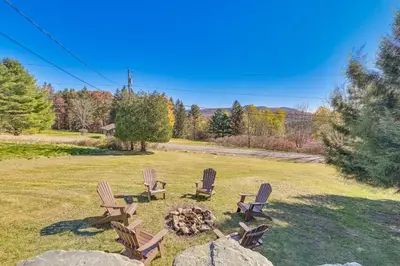 a group of chairs sitting around a fire pit at Cozy Mtn-View Chalet Less Than 2 Mi to Windham Slopes in Windham
