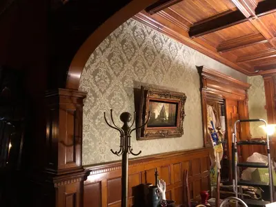 a room with a wall with a picture on it at Haslett House - A Gilded Age Estate in Fort Plain