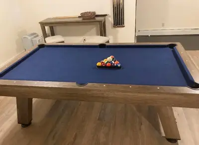 a blue pool table with a ball on it at Country Escape Overlooking Hunter & Windham Mts in Jewett