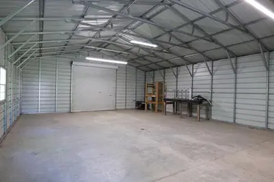 an empty garage with a table in it at High Falls Hideout in Catskill